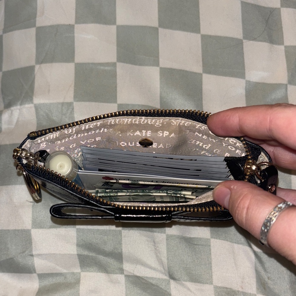 Kate Spade Glossy Black Leather Wristlet with Gold Ring — Storybook Lining - Picture 16 of 16